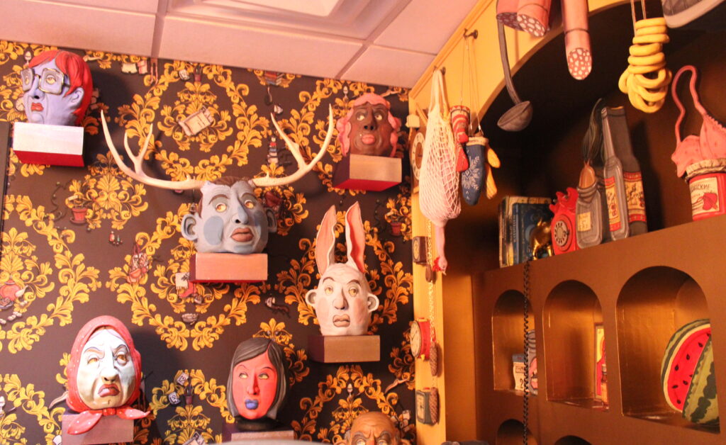 Installation with heads at Meow Wolf Grapevine