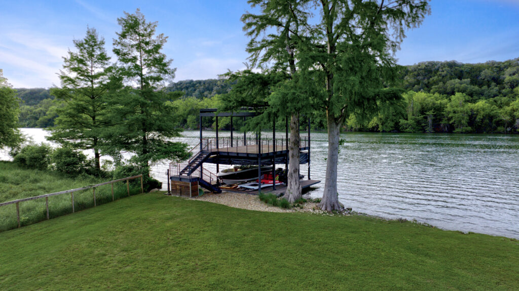 The Legacy of Lake Austin features 212 feet of lakefront crowned by a custom-designed boathouse.