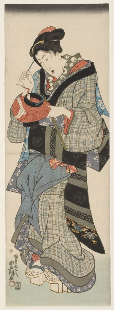 Kunisada-I-Woman-Holding-a-Paper-Lantern