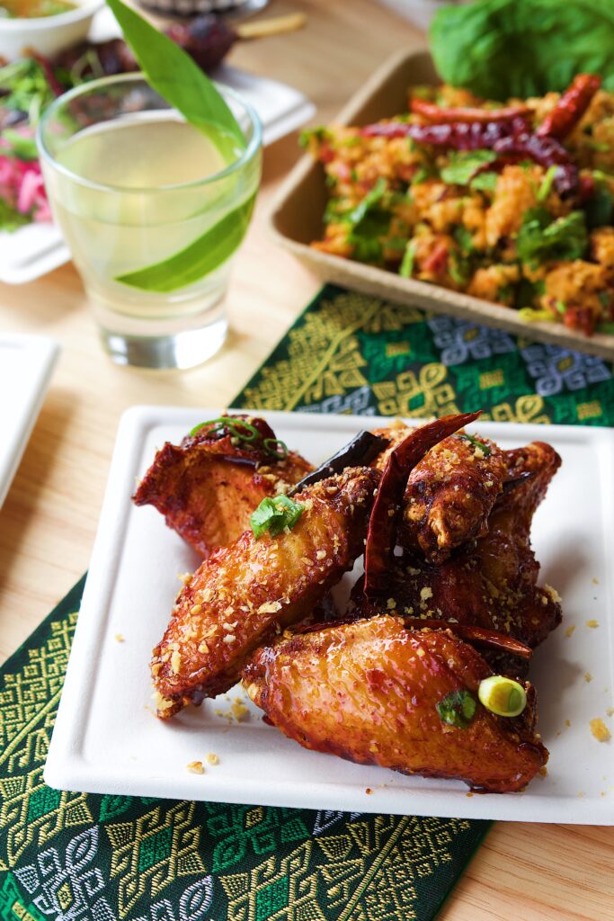 Enjoy wings and cocktails at Lao'd Bar in Austin, Texas.