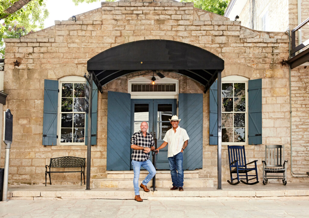 Chuck Smith and Larry Perdido in Front of Moonshine Grill in Downtown Austin