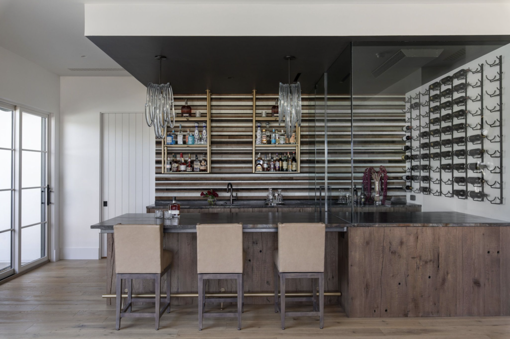 The bar area at Heaton Hollow incorporates beautiful wood and elegant modern lighting