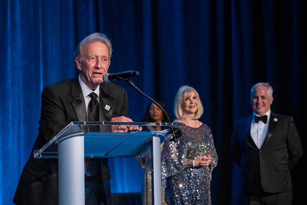 Rhett Stone at Ice Ball 2024 Accepting an Award