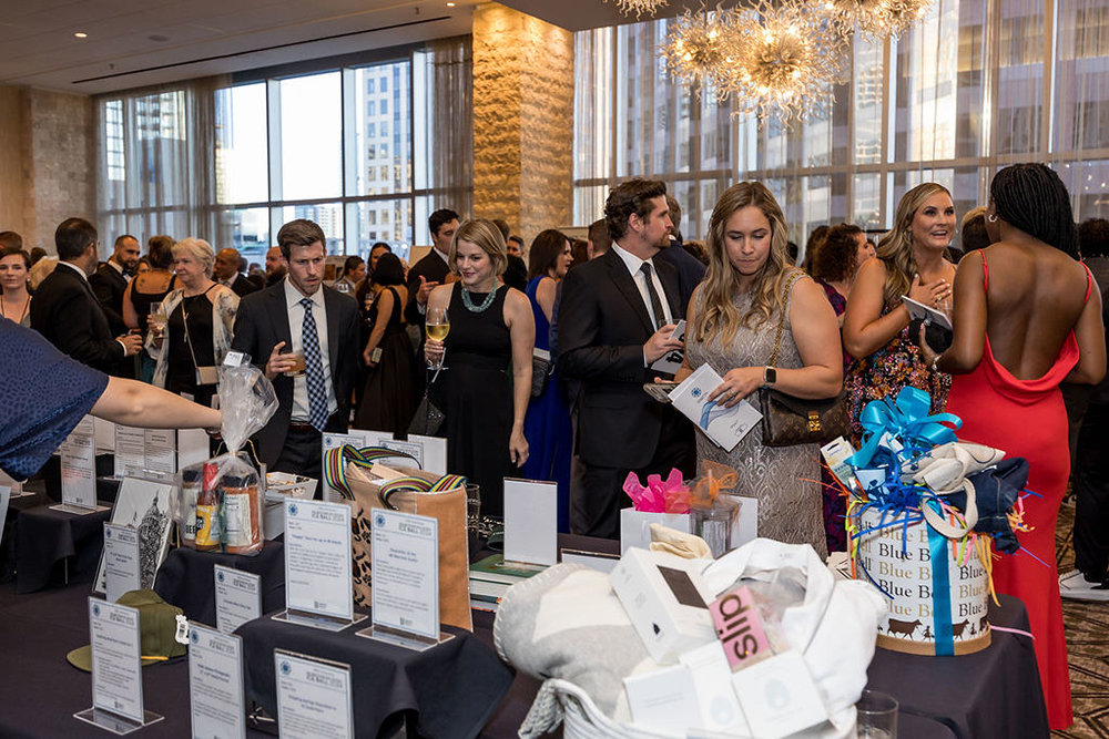 Attendees enjoying the BBBS Ice Ball 2024 reception