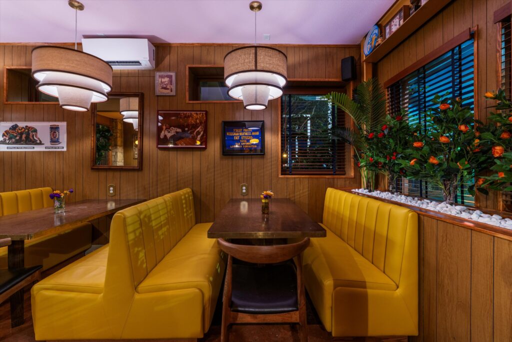 Guests can kick back in retro diner-style seating while enjoying drinks and bites.
