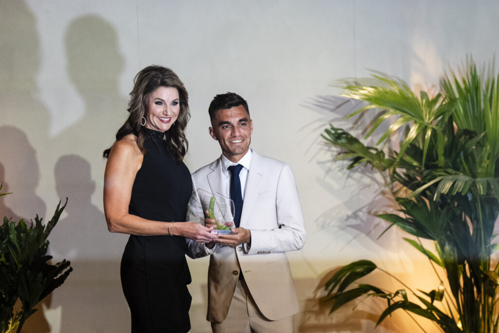Denise Bradley awarding Austin FC player Hector Jimenez with his Legend of the Year Award at Austin FC Gala Night at Q2 Stadium. (Photo by JJ Moothart/Austin FC)