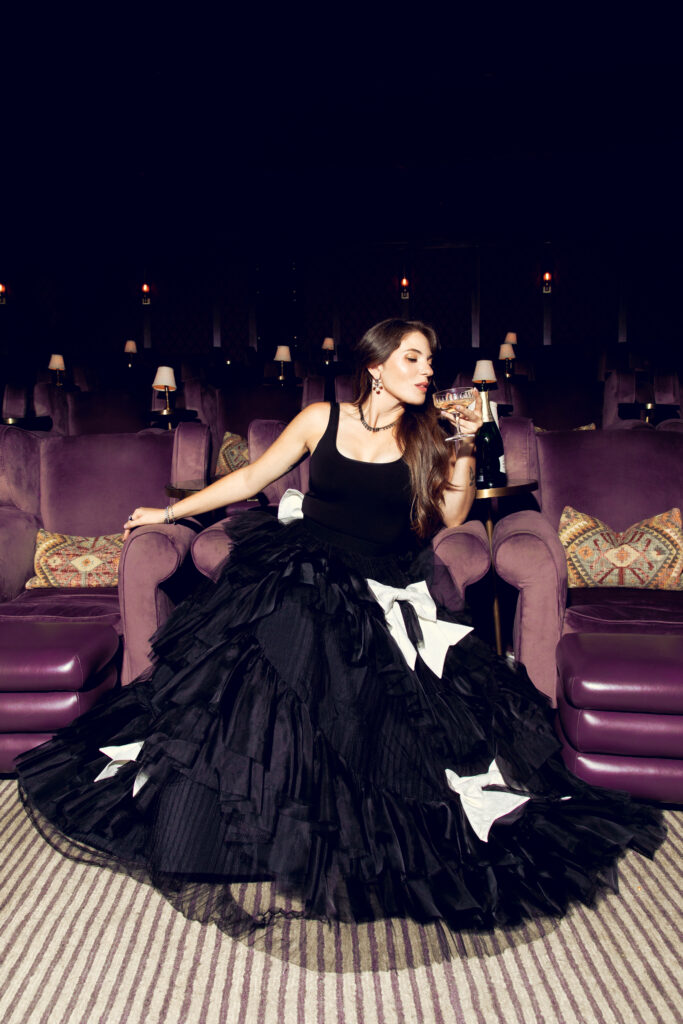 Jess wears a shirt and skirt from alice + olivia along with jewelry from Nak Armstrong (photo by Kaity Cox)