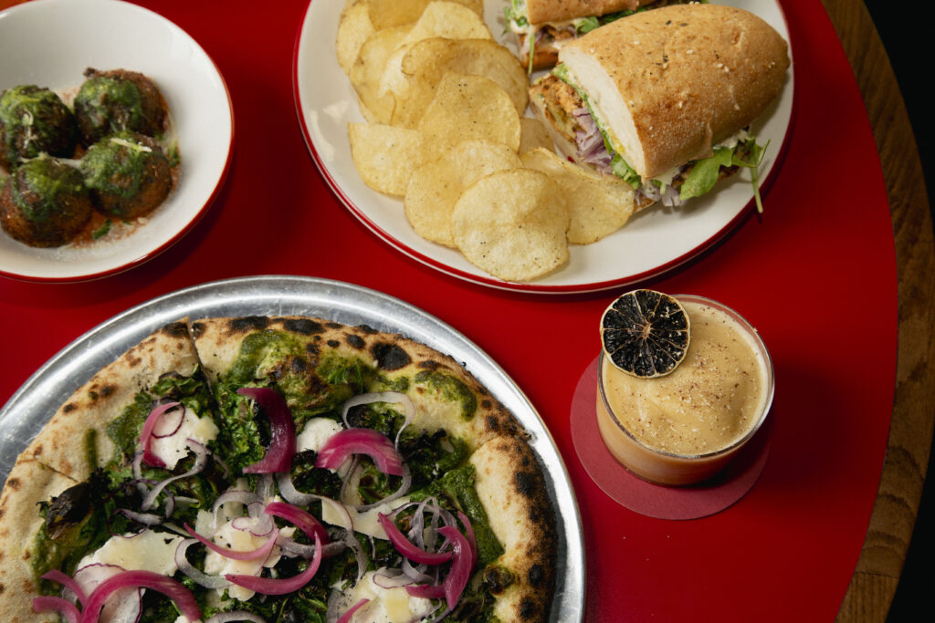 Loudmouth's emerald city pizza, meatballs, fried green tomato sandwich and frozen painkiller. (Photo courtesy of Loudmouth)