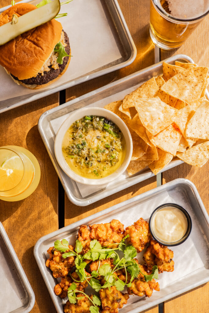 Cheeseburger, smoked shishito queso and chicken karaage from Loro. (Photo courtesy of Loro)