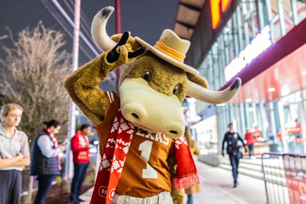 Bevo, the University of Texas mascot, greets attendees at the grand opening of the newly rebuilt South Congress H-E-B in Austin, Texas, on Wednesday, Dec. 4, 2024.