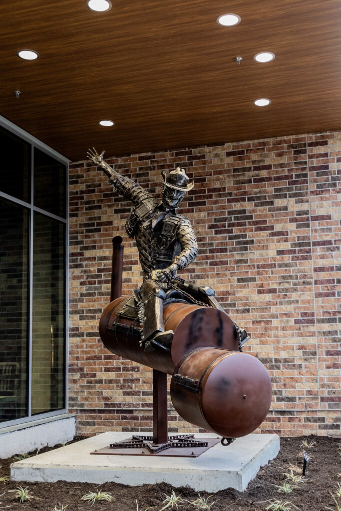 A sculpture designed by Corby Skiles of Texas Metal, crafted from recycled agricultural steel, is displayed at the newly renovated South Congress H-E-B. (Photo courtesy of H-E-B)