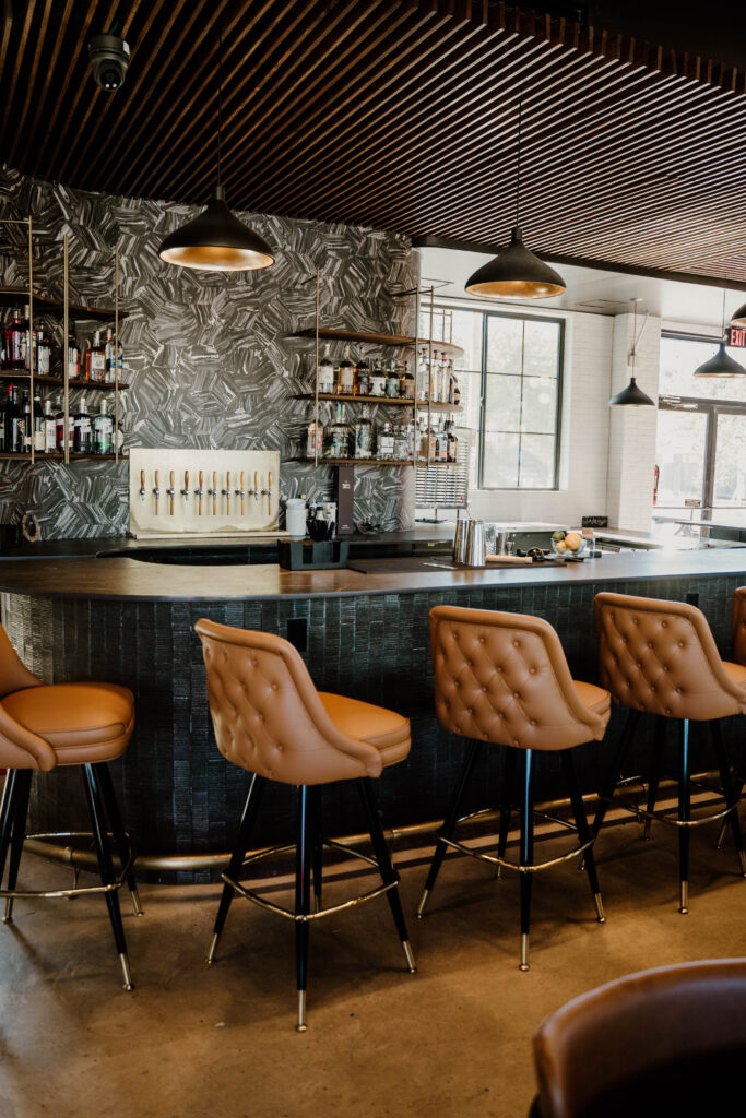 The bar area at Black Gold, showcasing a selection of mezcal, tequila and more.