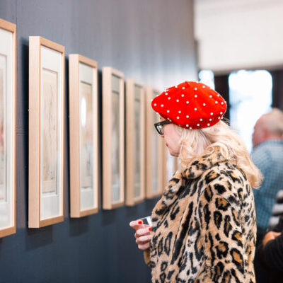Visitors explore the “Salvador Dalí: A Legacy in Surrealism” exhibition at West Chelsea Contemporary in Austin.