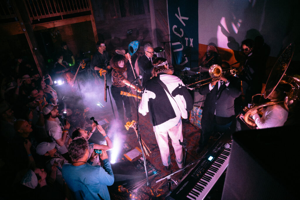 Grammy-winning band Arcade Fire performs a surprise set at the Luck Reunion festival in Spicewood. (Photo by Andrea Escobar)