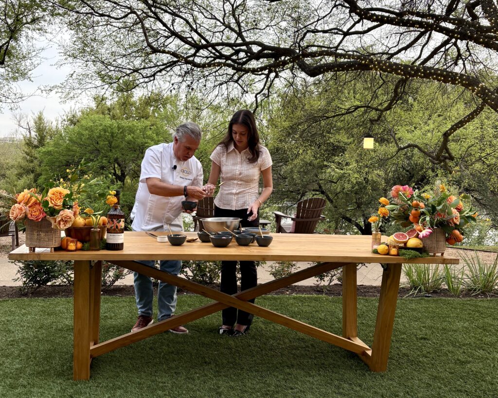 Chef Richard Sandoval and his daughter, Isabella Sandoval, prepare a ceviche dish during a Viva Abejas dinner and culinary demonstration at the Four Seasons Hotel in Austin. (Photo by Christina Garcia)