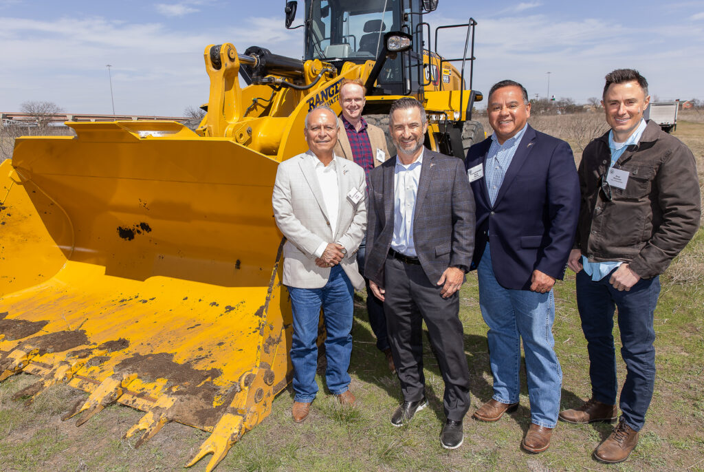 (From left) Brooks Bennett, Round Rock Councilmember Frank Ortega, Mayor Craig Morgan, Round Rock Councilmember Rene Flores, and Brad Wiseman at the groundbreaking of The District in Round Rock. (Photo courtesy of Mark IV Capital.)