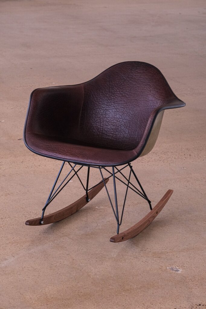 Full sized Eames Chair Fiberglass Upholstered Obsidian Leather Goods Chocolate Brown Bison with Rocker base walnut._-2