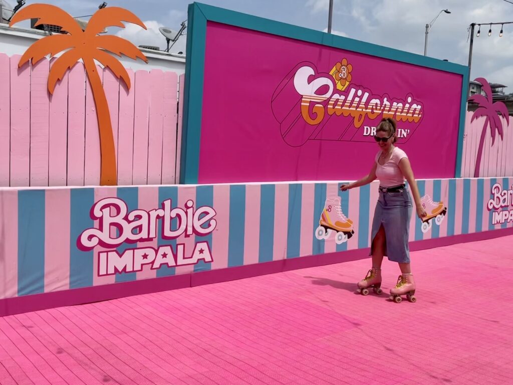 Lauren Petrowski takes a spin around the roller rink at Malibu Barbie Cafe's pop-up in Austin.