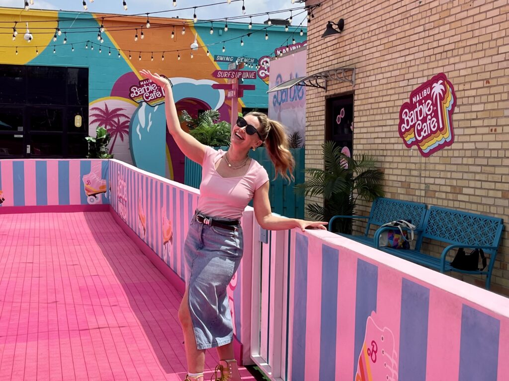 Lauren Petrowski takes a spin around the roller rink at Malibu Barbie Cafe's pop-up in Austin.