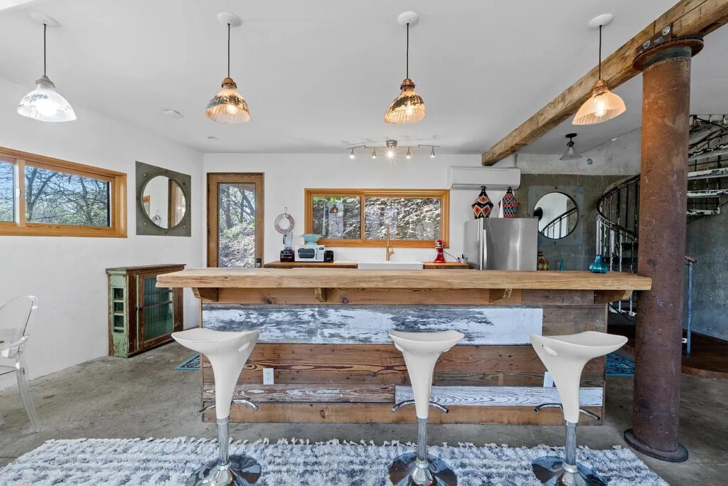 801 Post Oak St. kitchen with bar stools