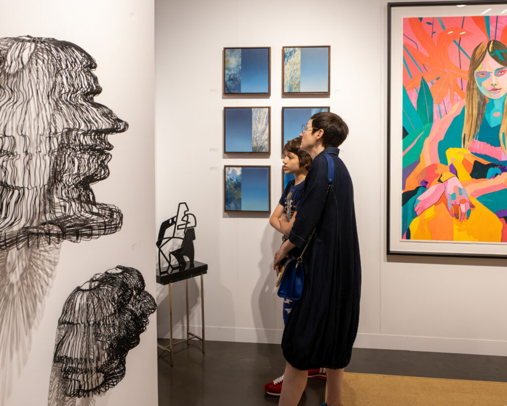 Visitors explore works from local and international galleries at the 2025 Affordable Art Fair, which returns to Austin with hands-on programming, family activities, and more. (Photo courtesy of Affordable Art Fair)