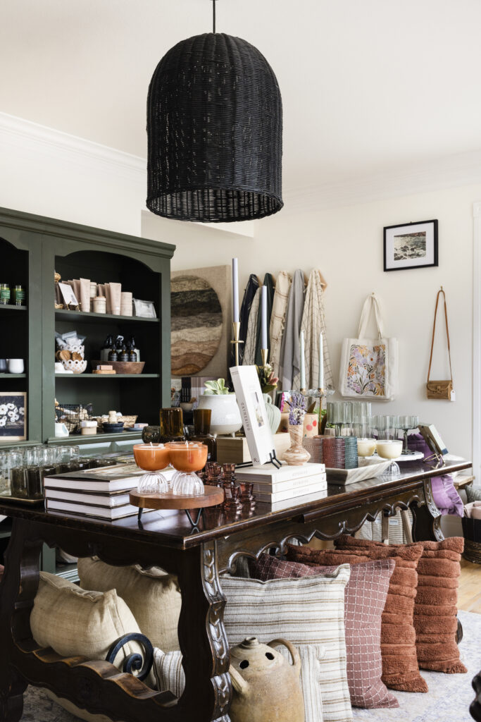 pillows, books, candles, and more home goods.