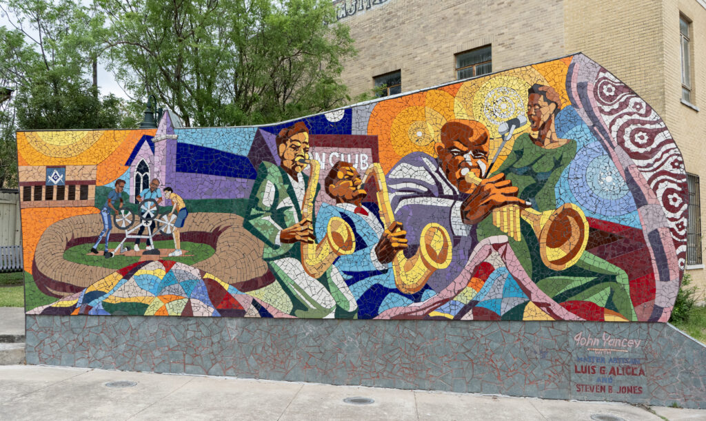 The "Rhapsody" mosaic in East Austin, created by University of Texas art professor John Yancey, honors the neighborhood’s rich blues and jazz legacy. (Photo by Cassie Butterfield)