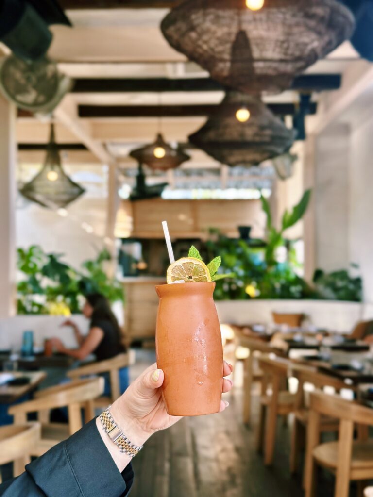 NOMADÉ - Cold beverage on the patio