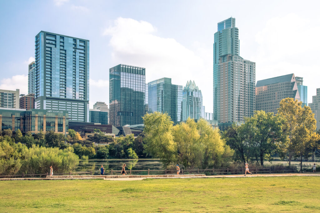 The 10-mile trail around Lady Bird Lake is one of the city’s most beloved outdoor spaces, drawing locals daily for exercise, relaxation, and community connection.
