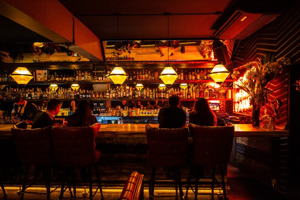 Guests enjoy craft cocktails at Hanky Panky, a speakeasy-style bar in Mexico City known for its inventive drinks. (Photo courtesy of Hanky Panky)