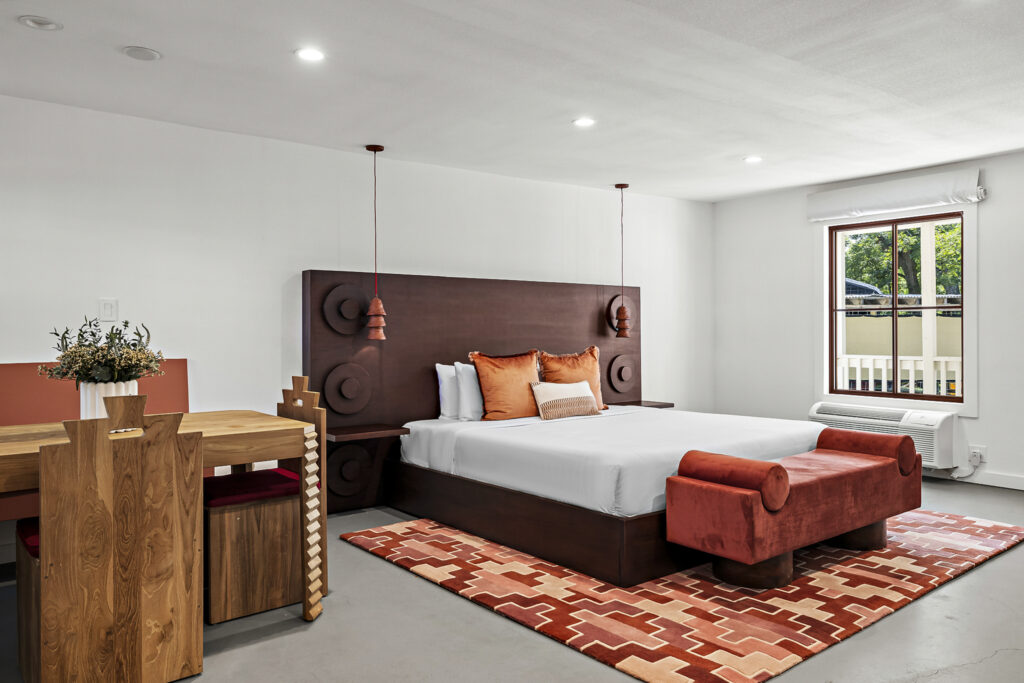 king bed and dining area