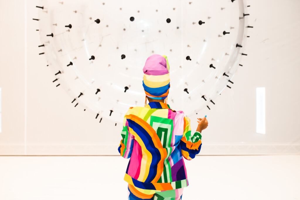 “ADA” by Karina Smigla-Bobinski is a kinetic sculpture that creates charcoal drawings on surrounding surfaces as it moves through space.