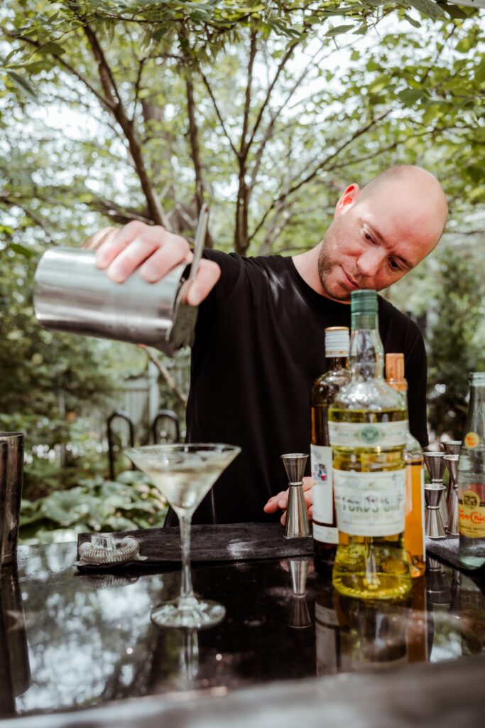 Bartender and James Beard Award nominee Bobby Heugel serves BLT martinis. (Photo by Grant Pifer)