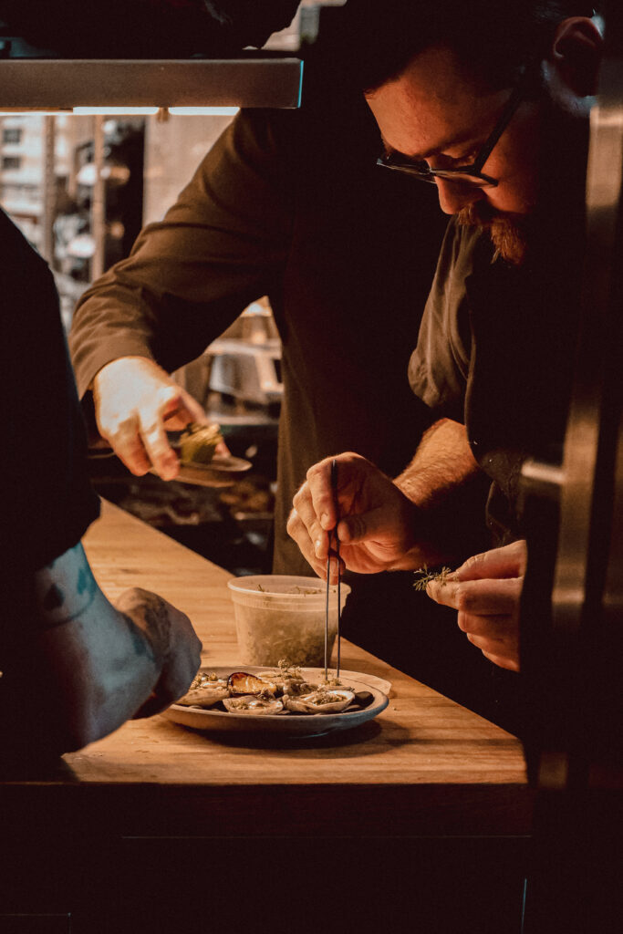 Hestia Kitchen Plating with Chef de Cuisine Paul Wensel. (Photo by Chris Praetzel)
