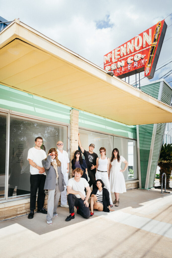 Artists represented by McLennon Pen Co. pose outside the gallery’s new location at 1114 W. Fifth St., which is open Tuesday through Friday from 11 a.m. to 6 p.m., and Saturday and Sunday from noon to 4 p.m. (Photo by Ismael Quintanilla III)
