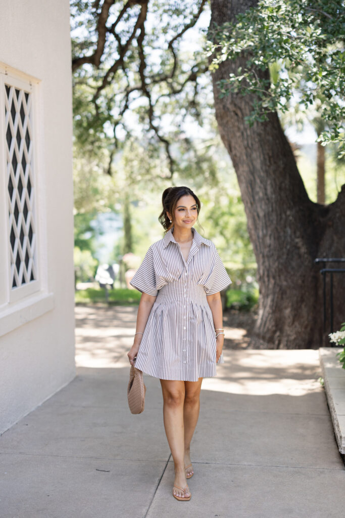 The @heynasreen Tobie Button-Front Pleated Mini Shirt Dress by Exquise