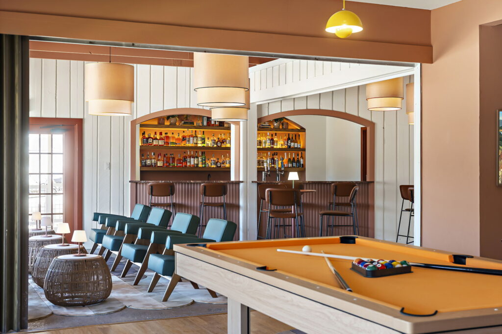 Del Sol Clubhouse & Bar has a full bar along with shuffleboard and a pool table.