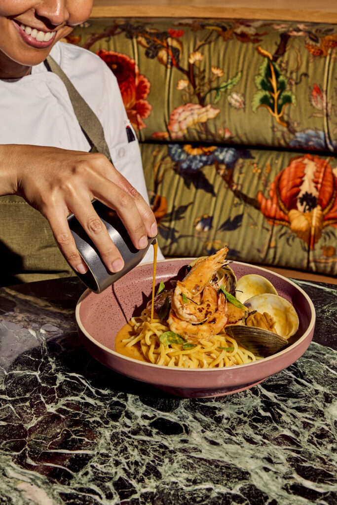 The Laksa at Siti features a coconut-galangal broth with dayboat scallops, wild Gulf prawns and fresh noodles.