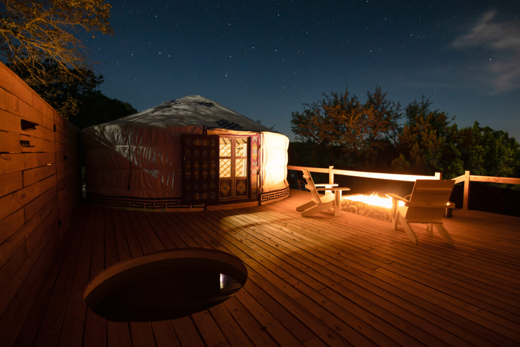 View of one of the glamping yurts at night. (Photo by Grant Pittman)