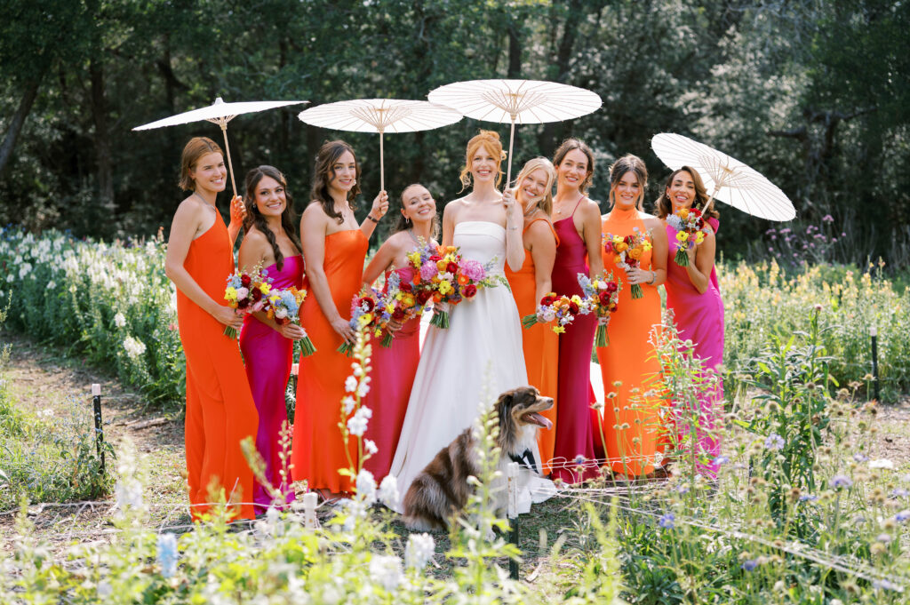 The bride with her bridesmaids and her dog Tex. (Photo by Katie Knotts)