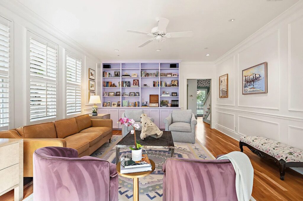 The home at 800 W. Lynn St. in Austin’s Clarksville neighborhood features colorful interiors, Katie Kime wallpaper and pastel accents.