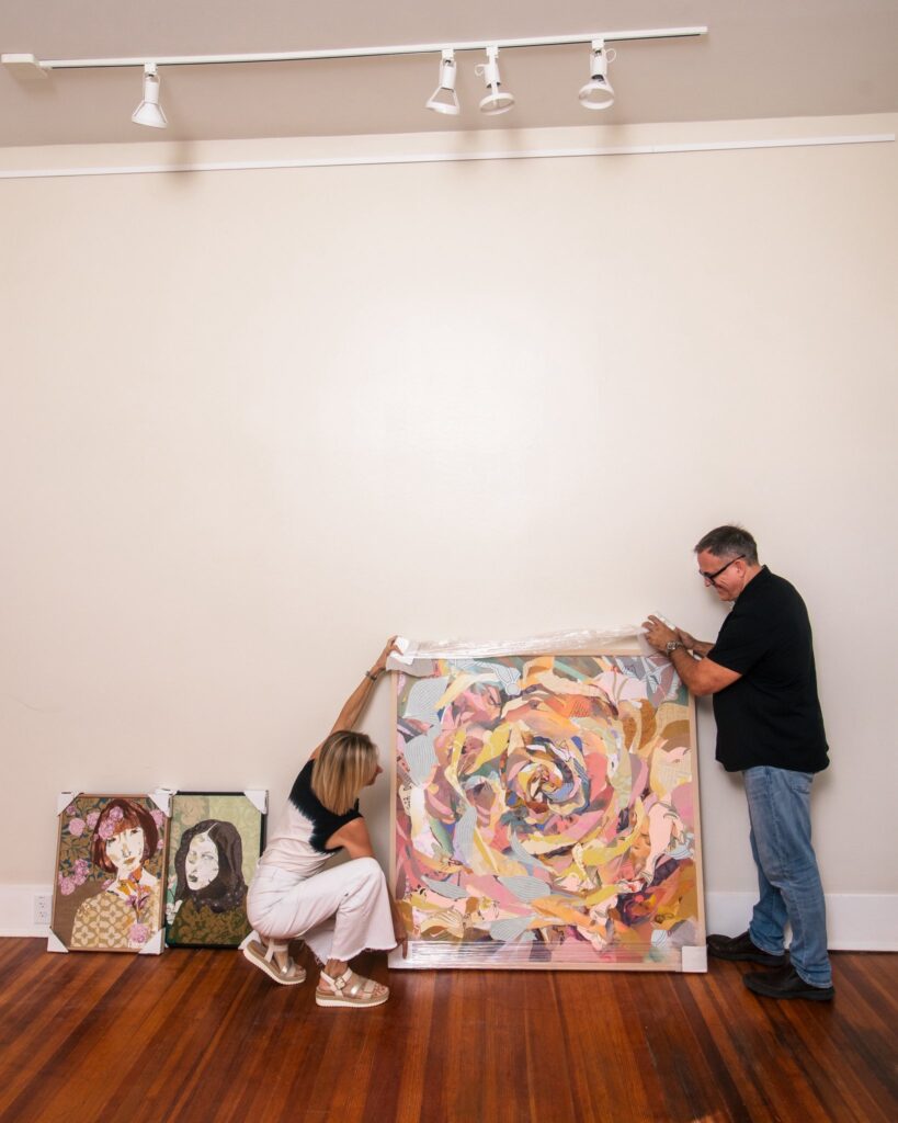 Diana and Geoff Chriswisser setting up the new gallery space, opening this September. (Photo courtesy of Verdant Gallery)