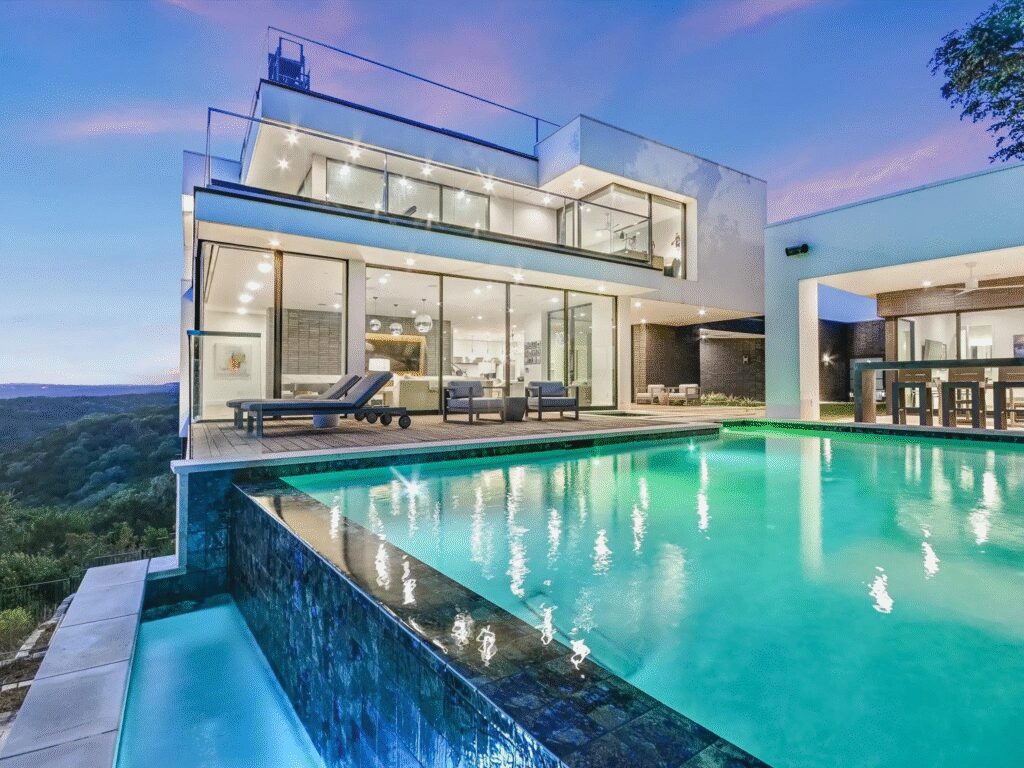 6607 W. Courtyard Drive features an infinity pool with panoramic views of Lake Austin, the Pennybacker Bridge and the downtown skyline.