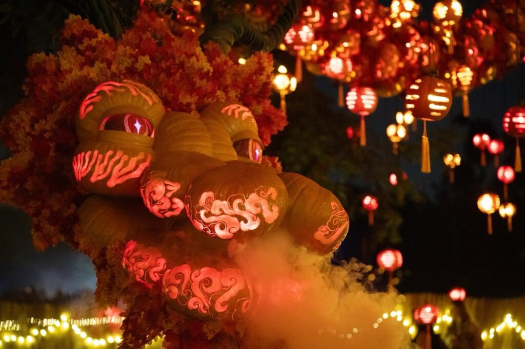 Pumpkin carving in the shape of dragon at PumpkinNights