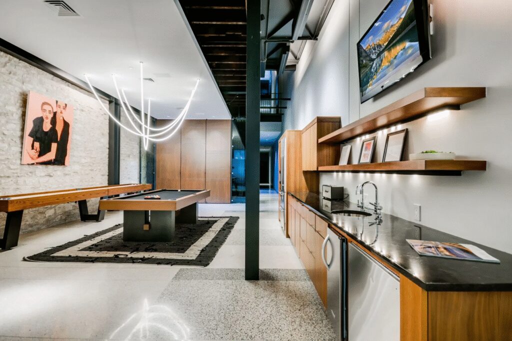 Built more than 150 years ago, the home features original limestone and brick, a rooftop pool, a media room and flexible zoning for residential or commercial use in downtown Austin.