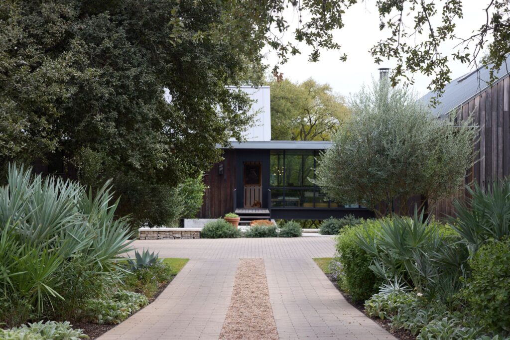 Studio Balcones’ "Shoal Creek Sanctuary" features native plantings, shaded walkways, and a secluded “secret garden” dipping pool.