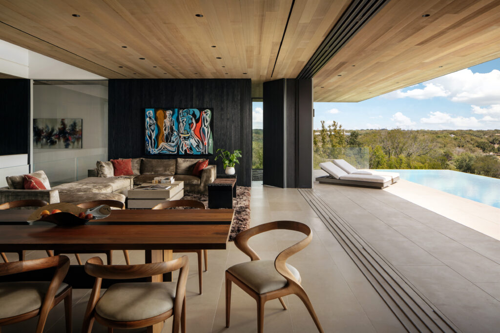 The pool deck doubles as a serene retreat and a social hub, balancing crisp architecture with the natural landscape. (Photo by Chase Daniel)