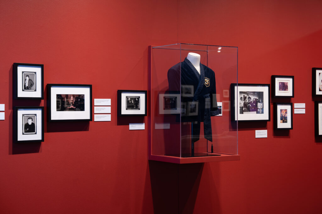 The exhibiton features highlights of SNL's legacy, including musical guests, cultural commentary, famous sketches and key cast members across the decades.