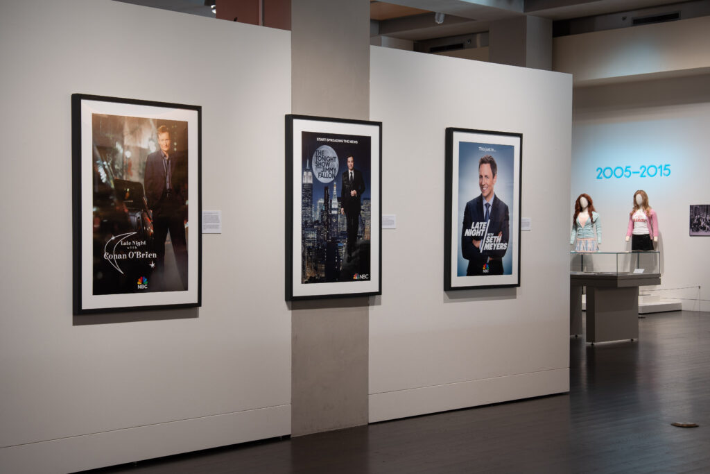 Posters featuring NBC late-night television hosts Conan O’Brien, Jimmy Fallon and Seth Meyers