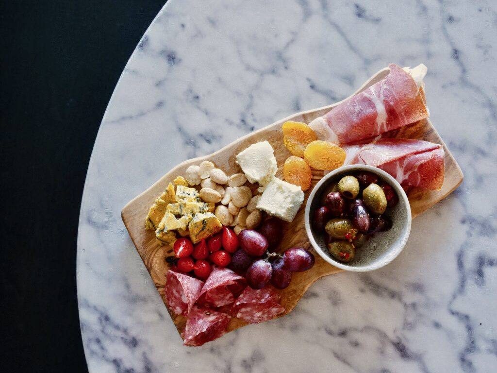 Flourish’s charcuterie board features an assortment of meats, cheeses and snacks to pair with wine.